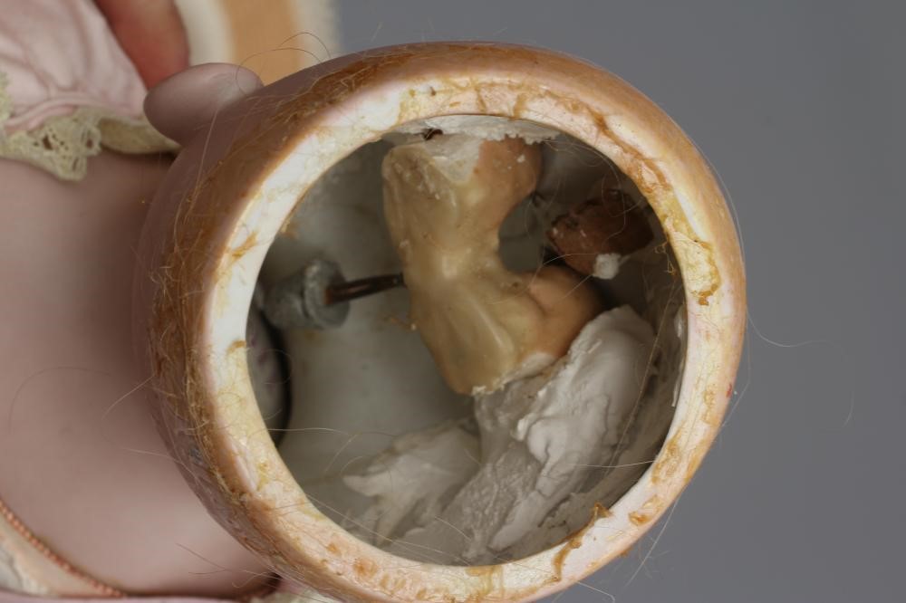 A Simon & Halbig bisque socket head doll Image