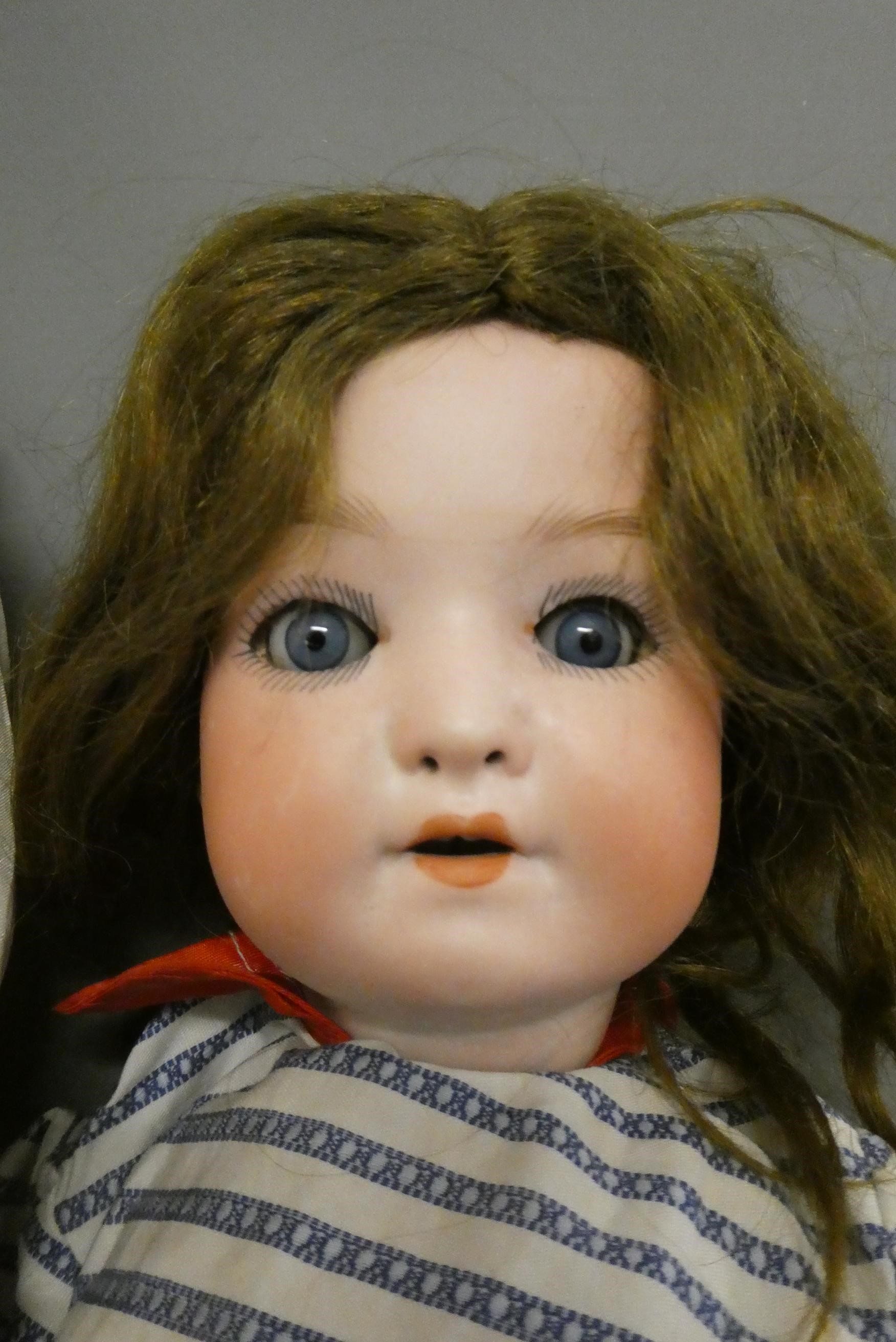 Two German bisque socket head dolls Image