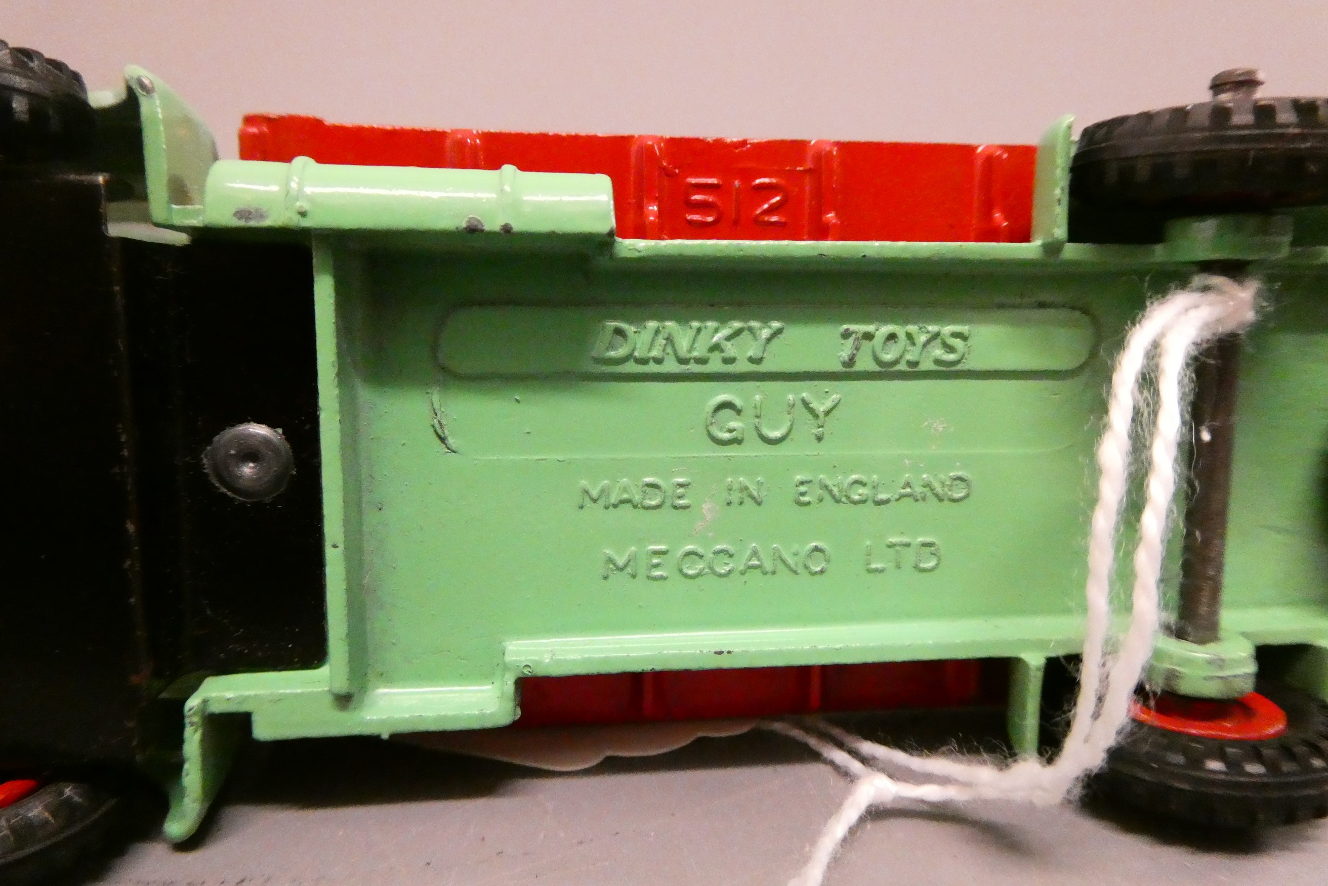 Dinky 512 Guy flat truck finished in red and green with windows, good to excellent (Est. plus 24% Image