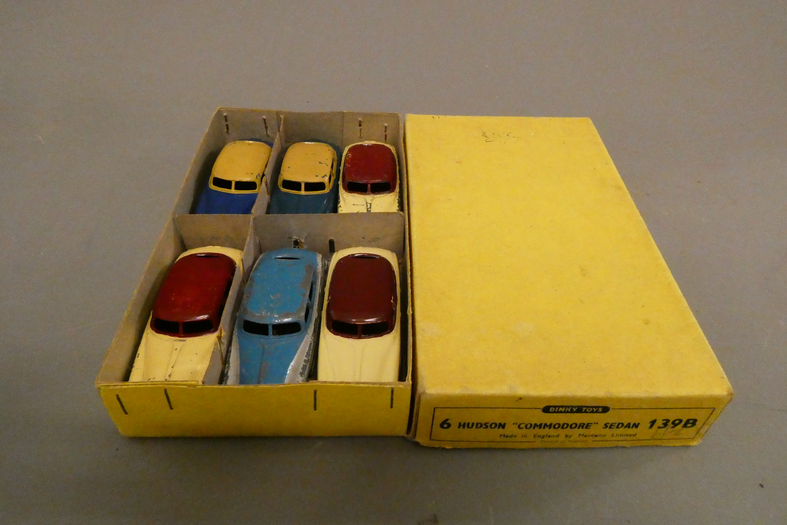 Six Dinky 139B Hudson Commodore Sedans in dealer box, box fair, models poor (Est. plus 24% buyer's Image