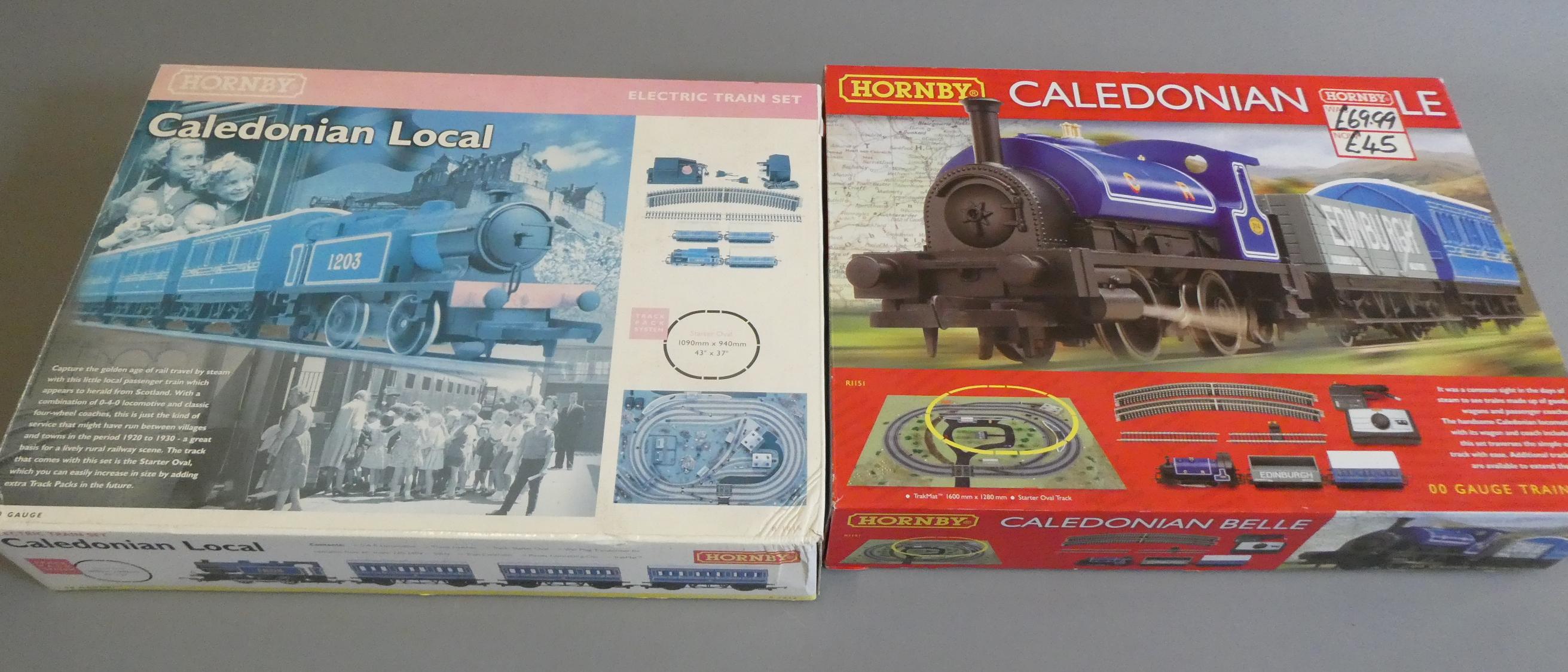 Two boxed Hornby starter sets comprising Caledonian Local, boxed, excellent and Caledonian Bell, Image