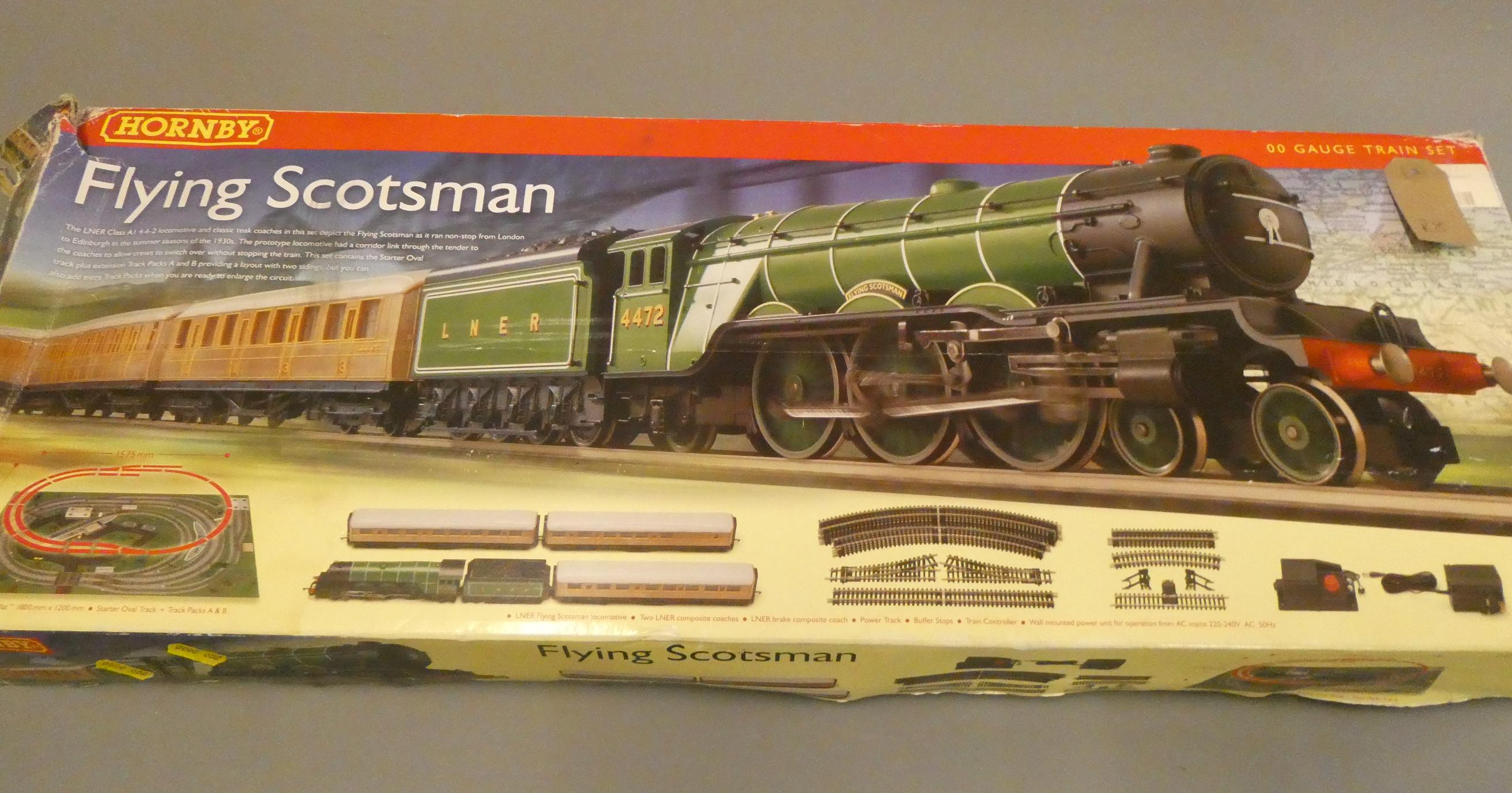 Hornby Flying Scotsman train set, one coach bogie missing, box fair, models good (Est. plus 24% Image