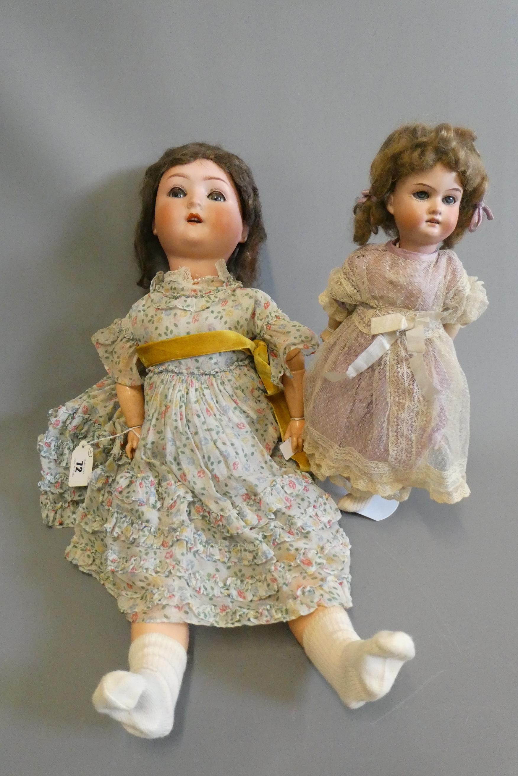 Three bisque socket head dolls Image