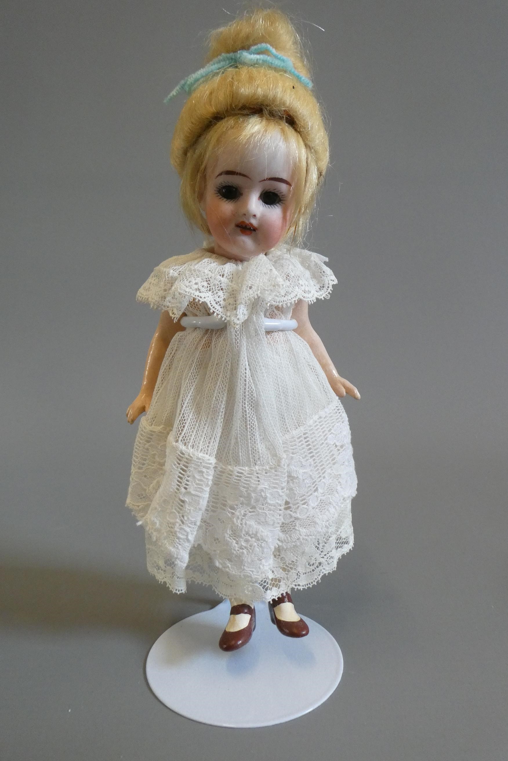 Three bisque socket head dolls Image