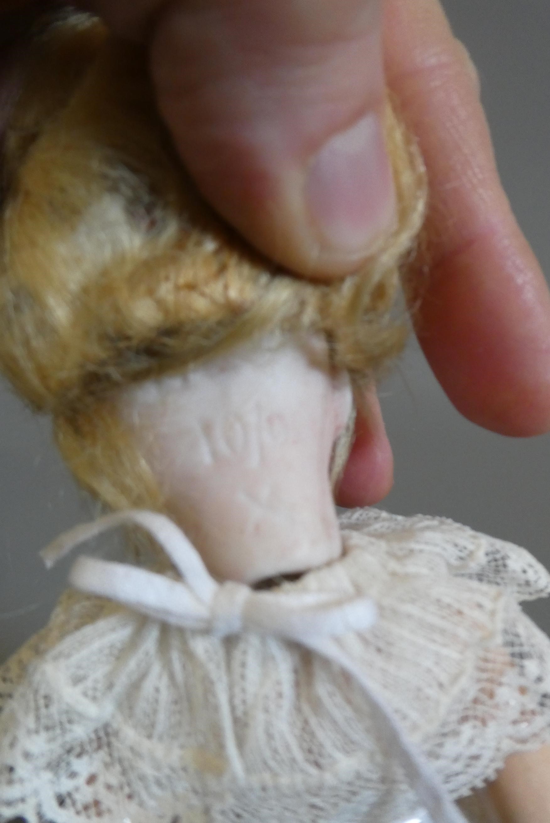 Three bisque socket head dolls Image