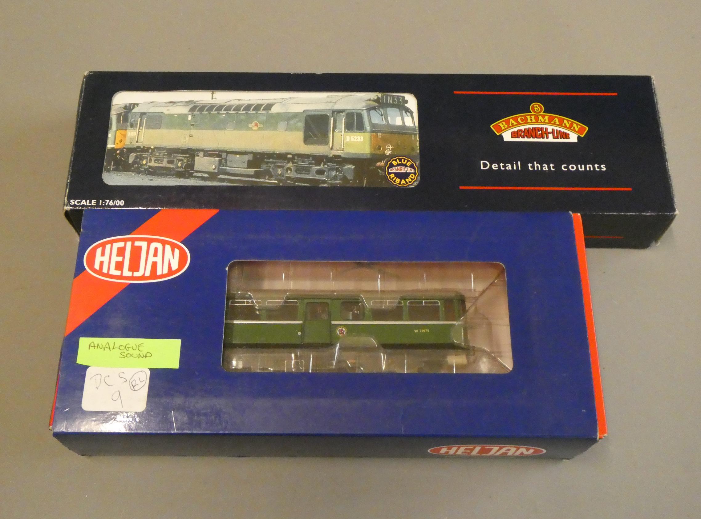 Bachmann Class 25 diesel locomotive in British Railways two tone green livery and Heljan AC rail car Image