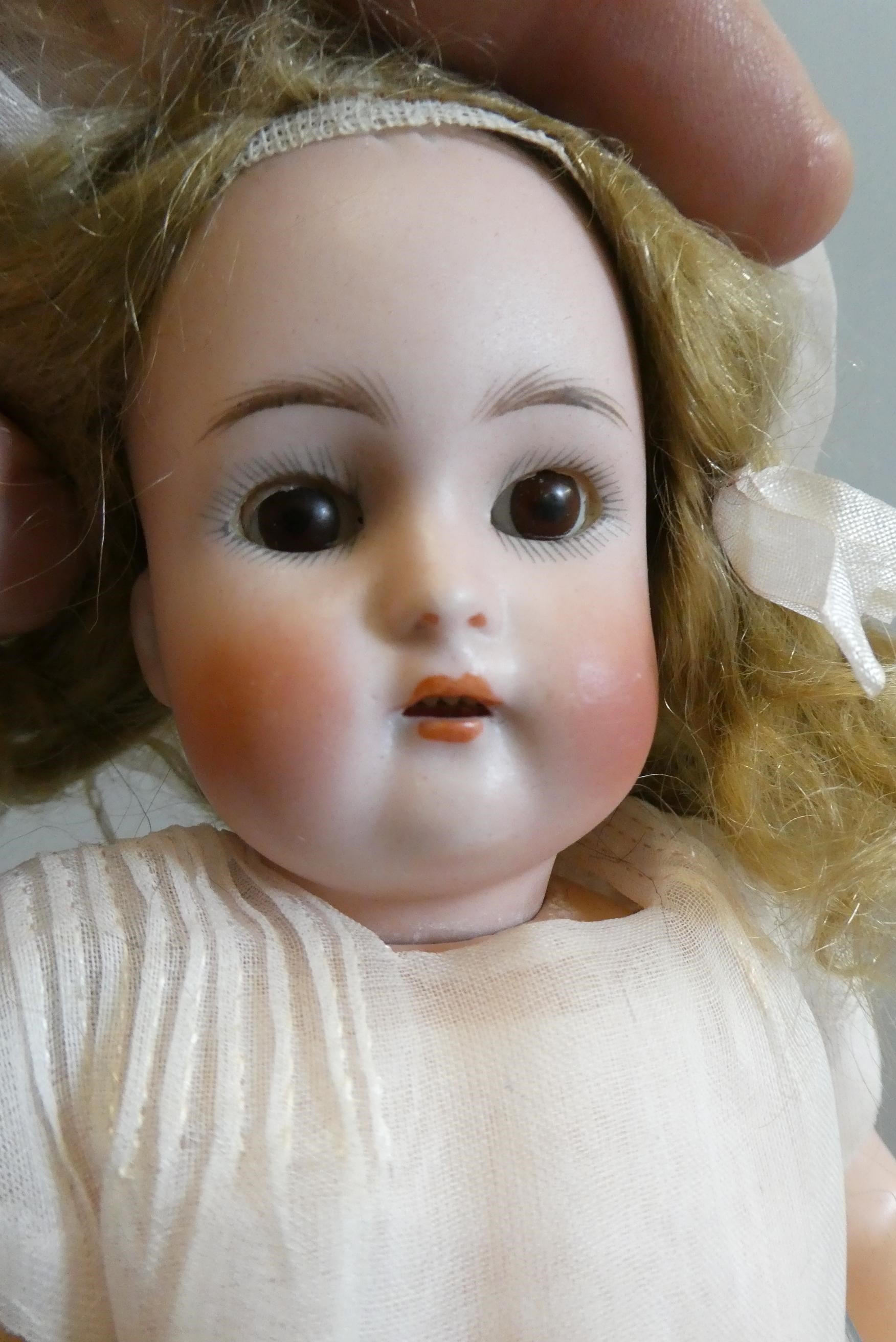 A Kammer & Reinhardt Simon & Halbig bisque socket head doll Image