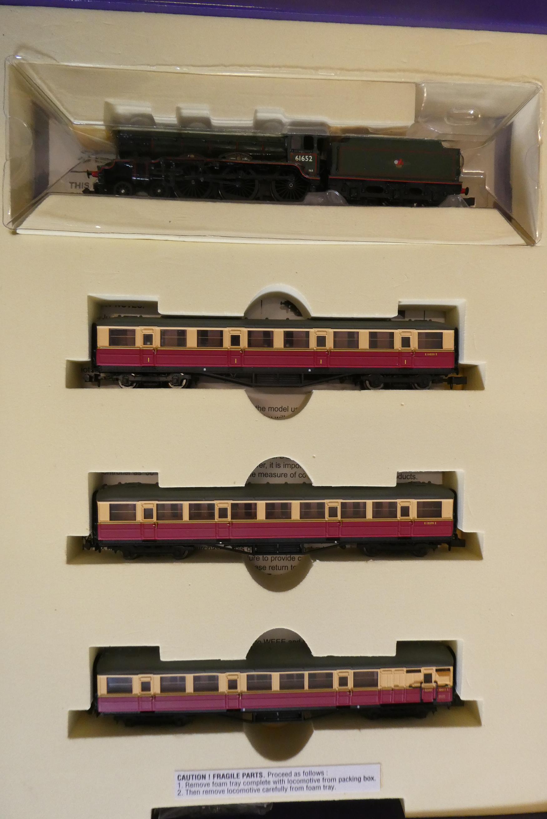 Dapol N-gauge train set with B17 locomotive and three BR coaches. The loco has been repainted or Image