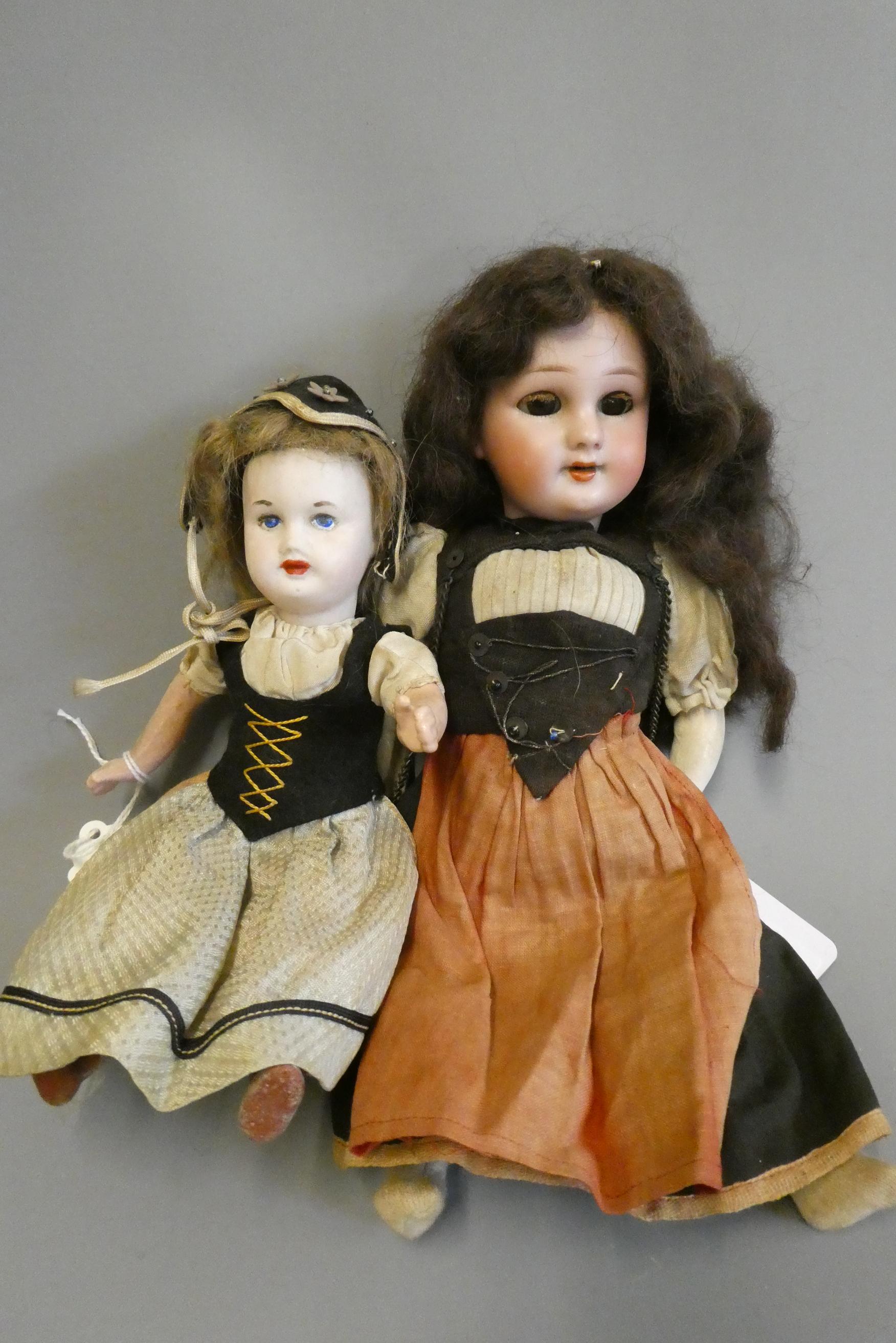 Two bisque socket head dolls Image