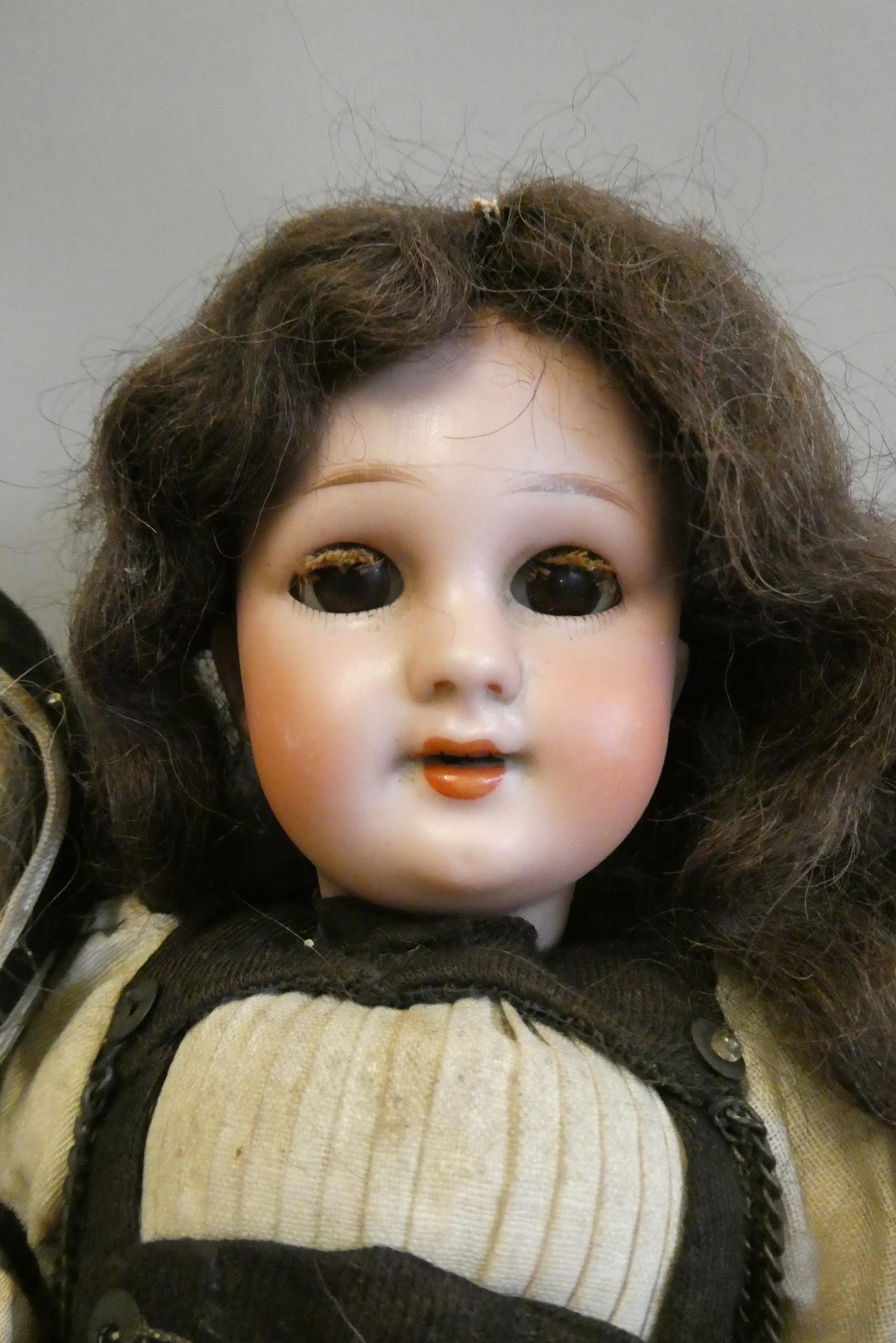 Two bisque socket head dolls Image
