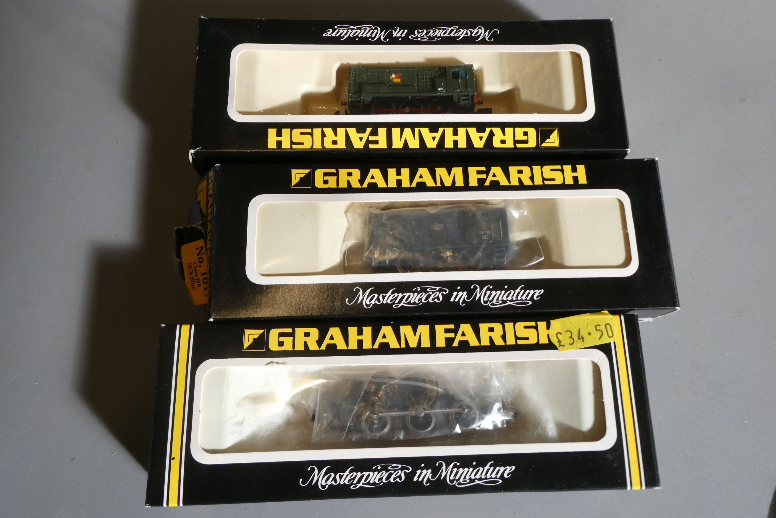 Two Graham Farish 08 Class diesel shunters and one 0-6-0 chassis, boxed, good (Est. plus 24% buyer's Image
