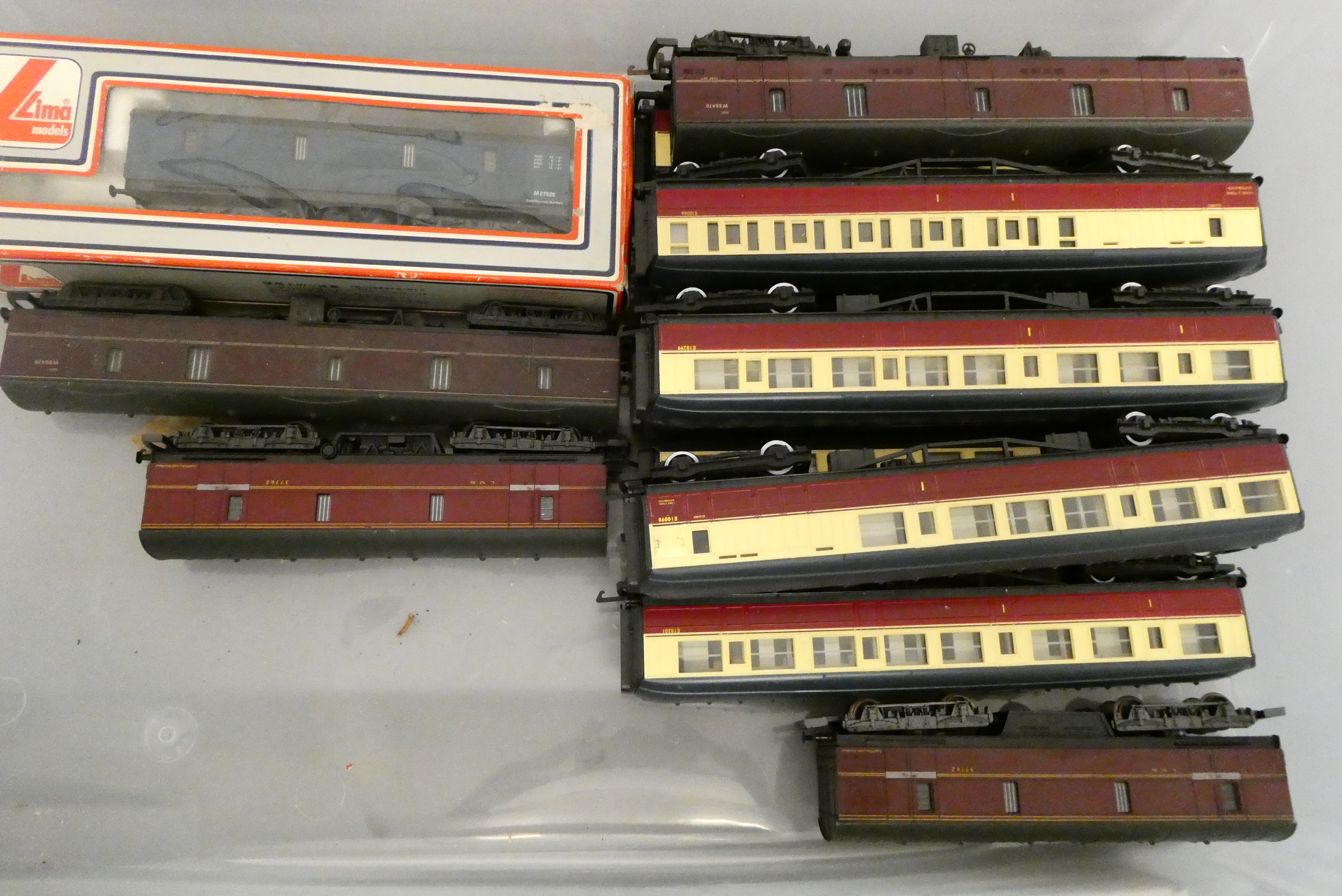 Nineteen BR passenger coaches and utility vans by Hornby, Lima and others including red/cream Image