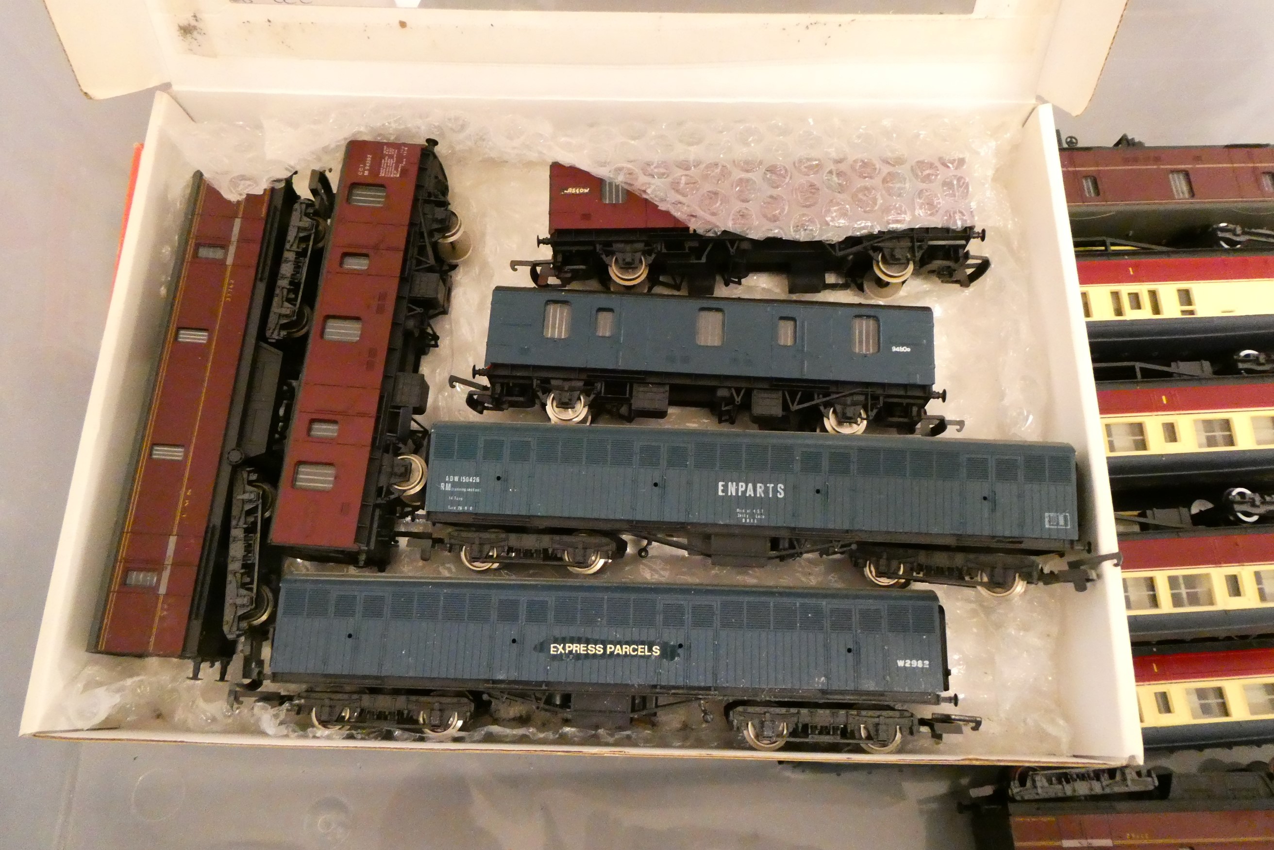 Nineteen BR passenger coaches and utility vans by Hornby, Lima and others including red/cream Image