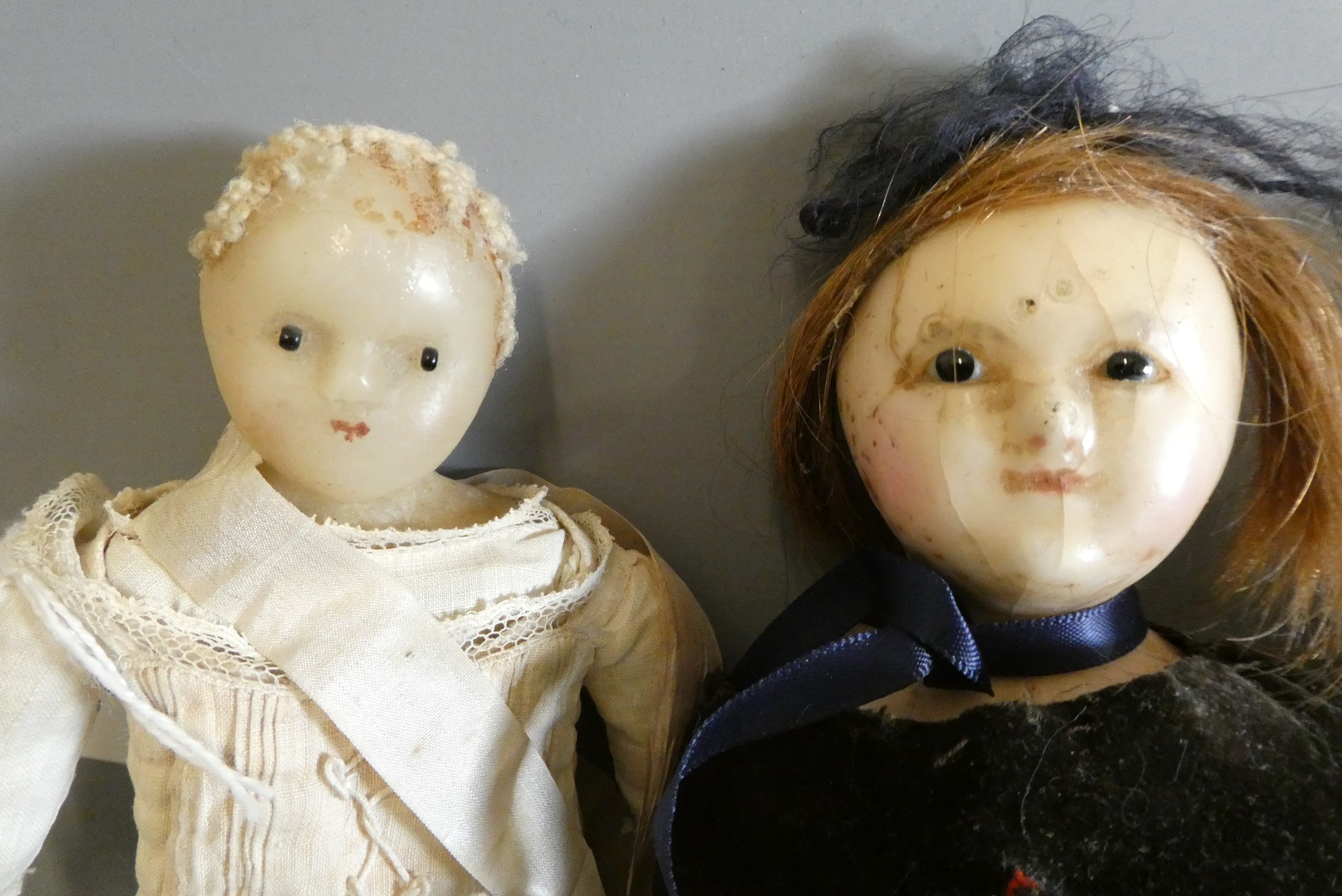 Three Victorian wax shoulder head dolls Image