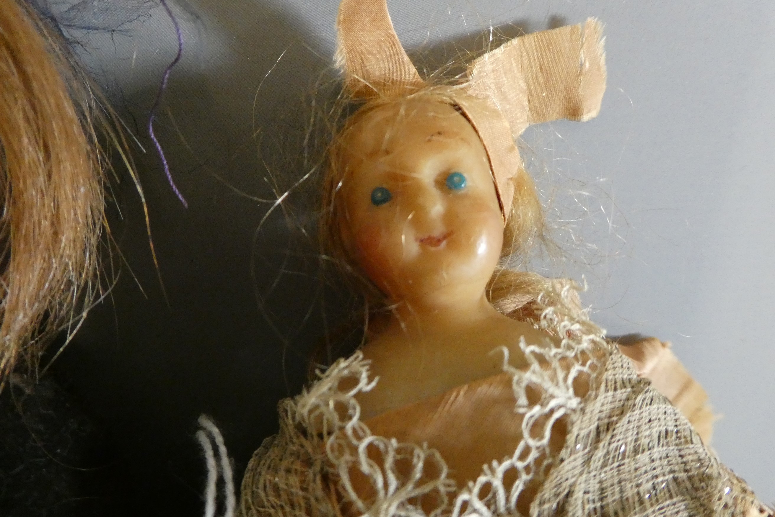 Three Victorian wax shoulder head dolls Image