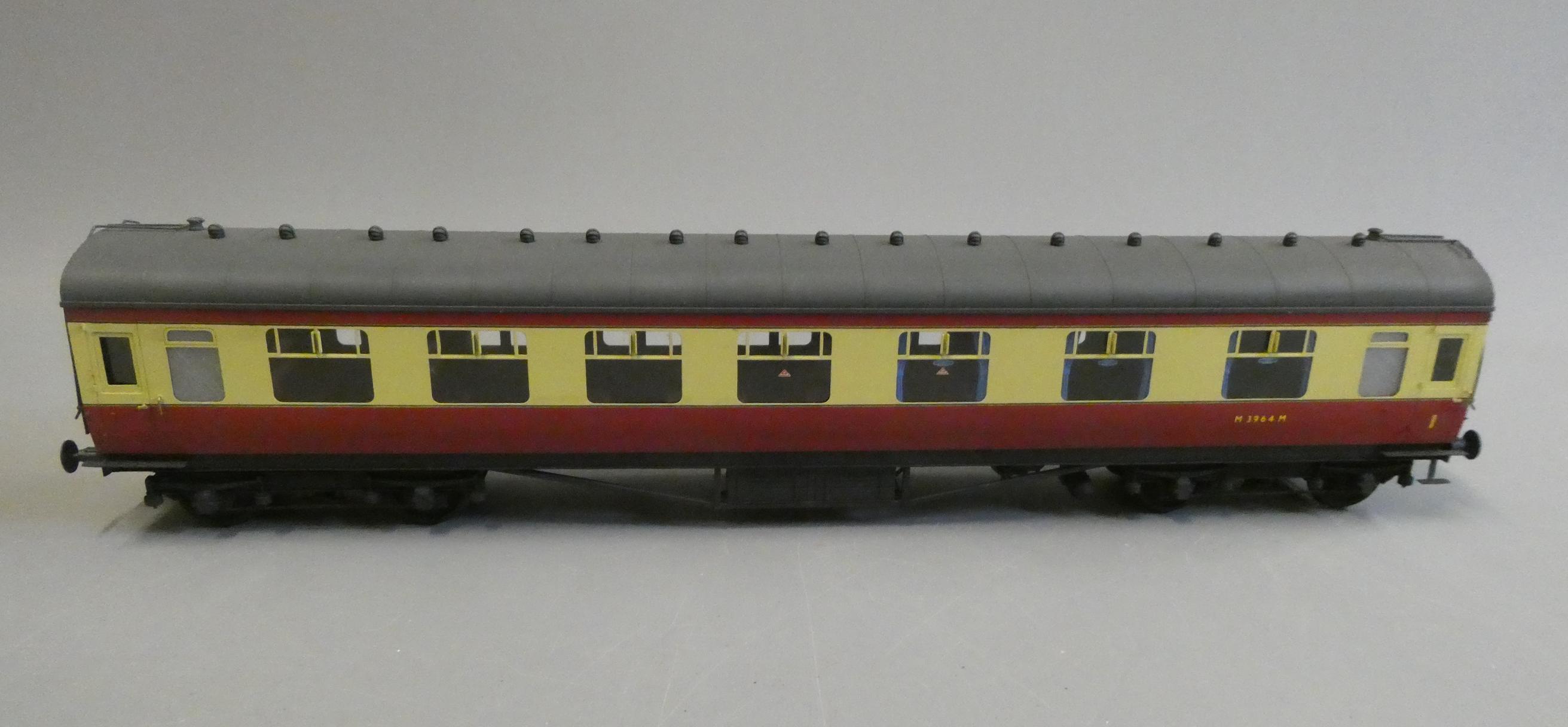 A well-made and finished 7mm 0 Gauge British Railways corridor composite coach finished in red and Image