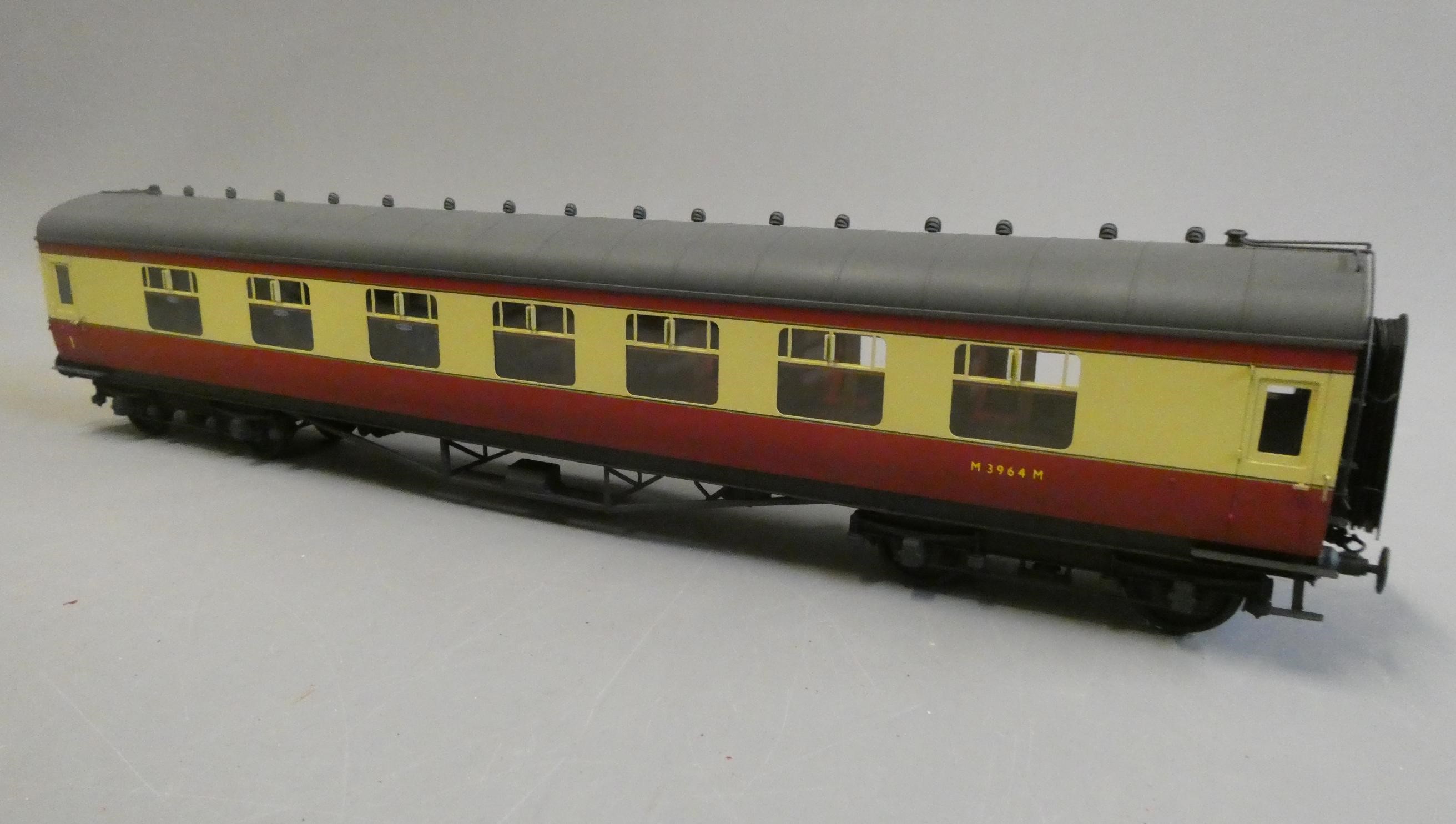 A well-made and finished 7mm 0 Gauge British Railways corridor composite coach finished in red and Image