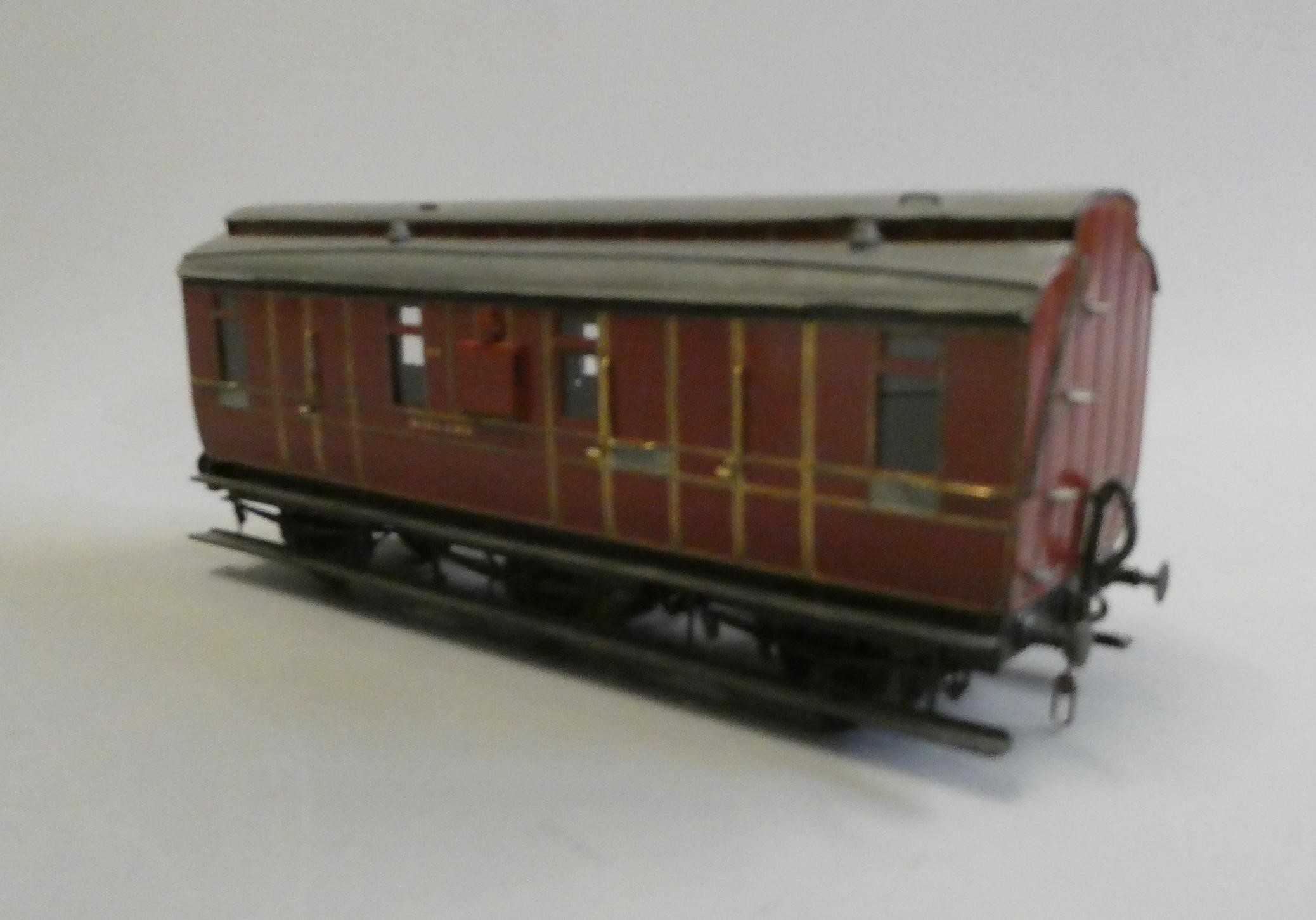 A well-made and finished 7mm 0 Gauge model of a Midland Railway panelled 6 wheeled brake coach Image
