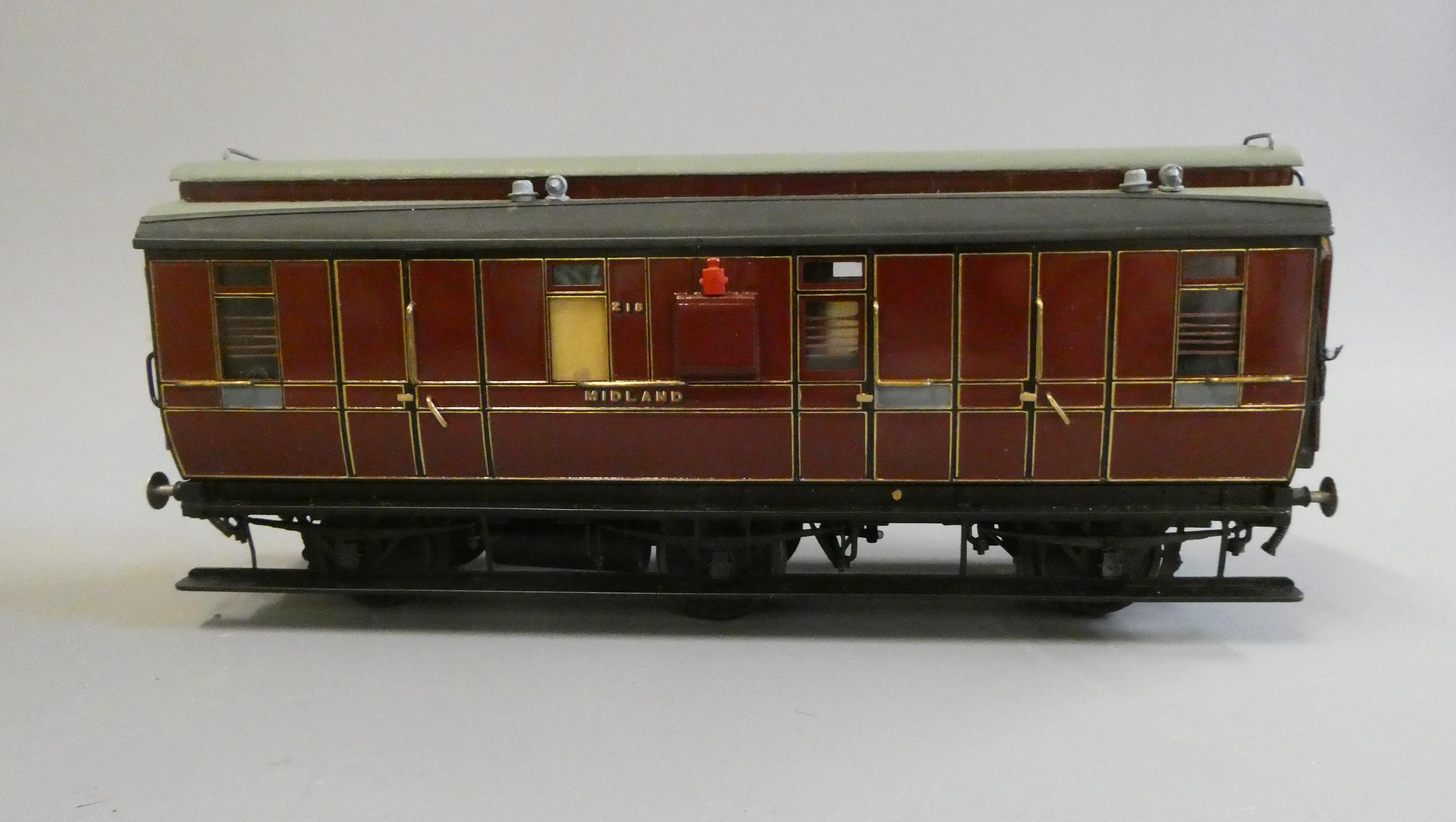 A well-made and finished 7mm 0 gauge model of a Midland Railway six wheeled corridor break coach Image
