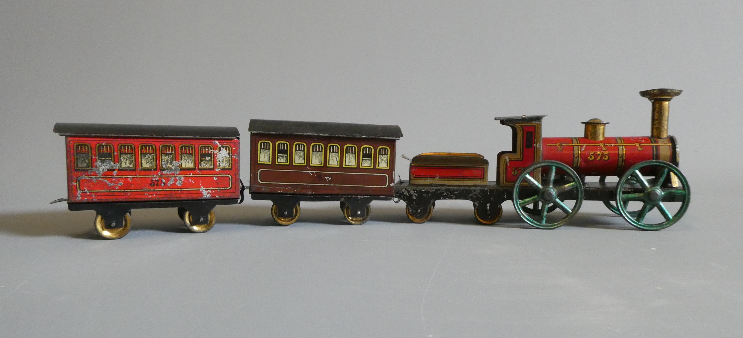 Hess clockwork floor train comprising locomotive and two coaches, paint loss and rubbing to plated Image