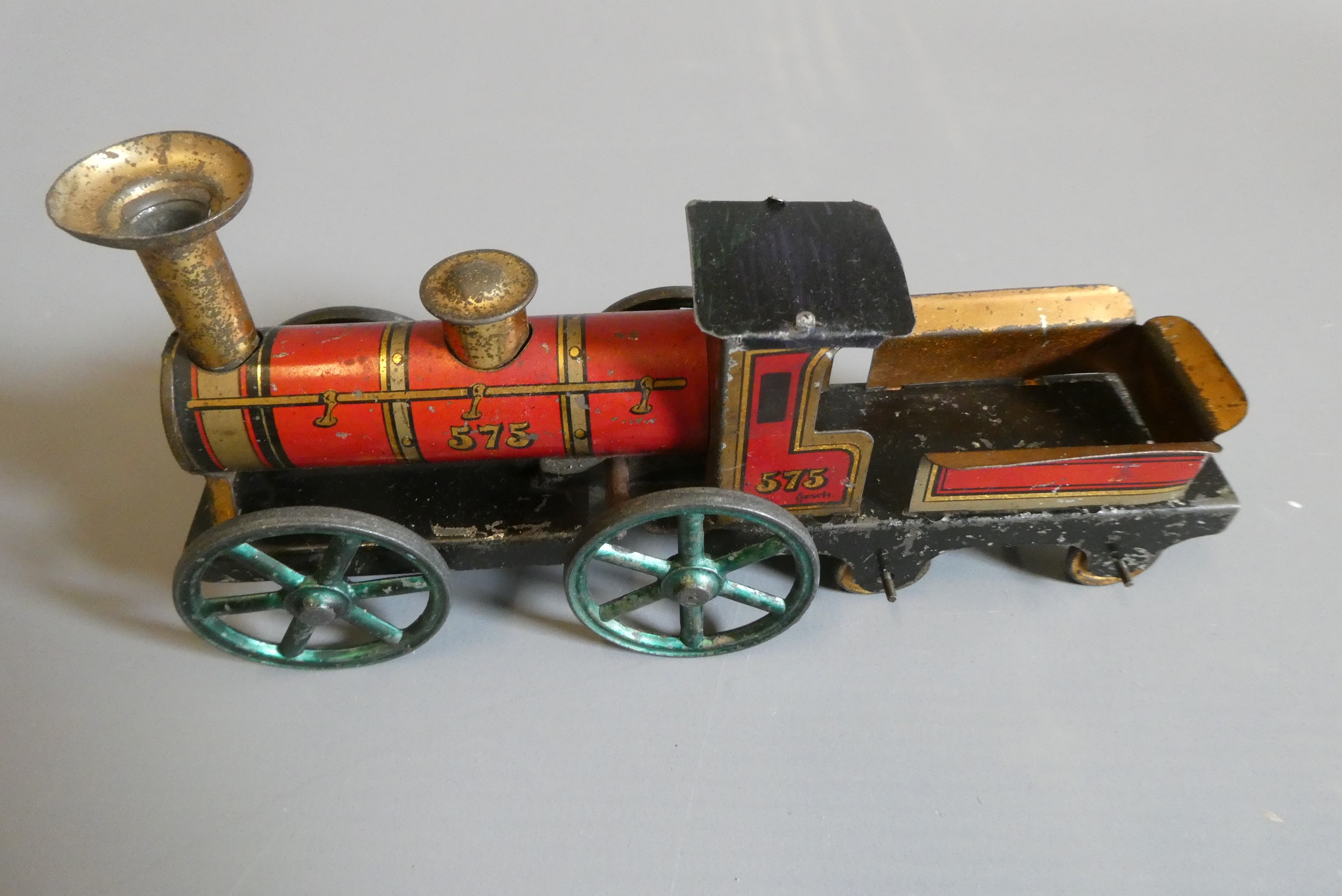 Hess clockwork floor train comprising locomotive and two coaches, paint loss and rubbing to plated Image