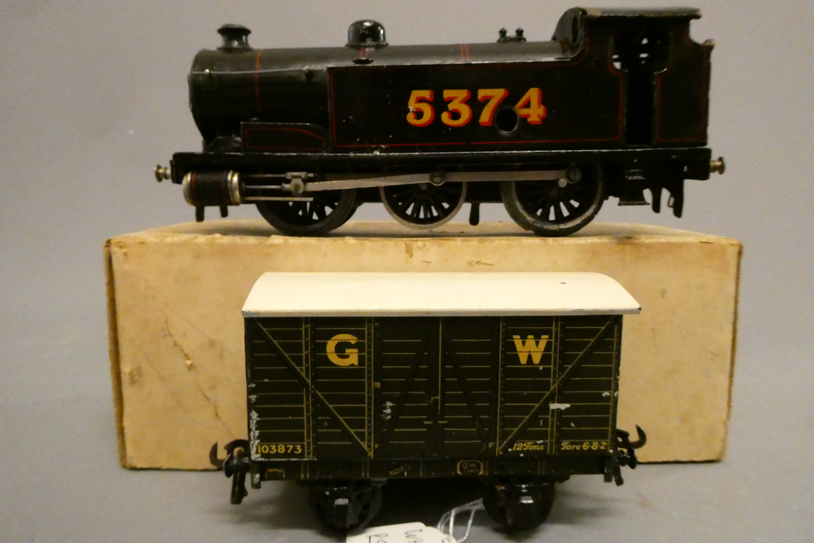 Bassett-Lowke clockwork 0-6-0 tank 5574 fitted with incorrect wheels, with metal fatigue, and a GWR Image