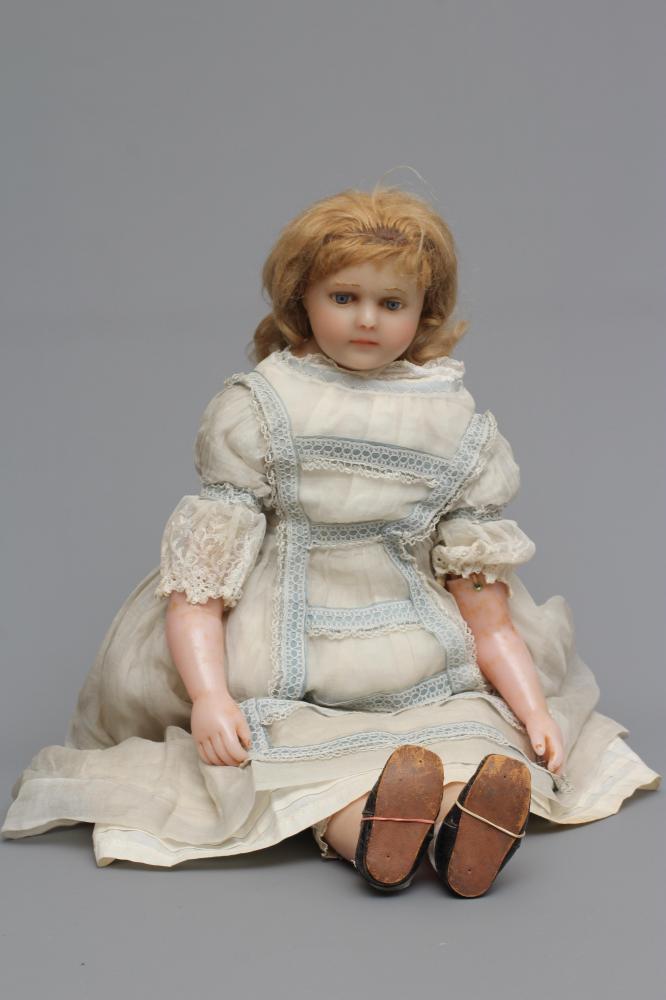 A large Victorian wax shoulder head doll Image