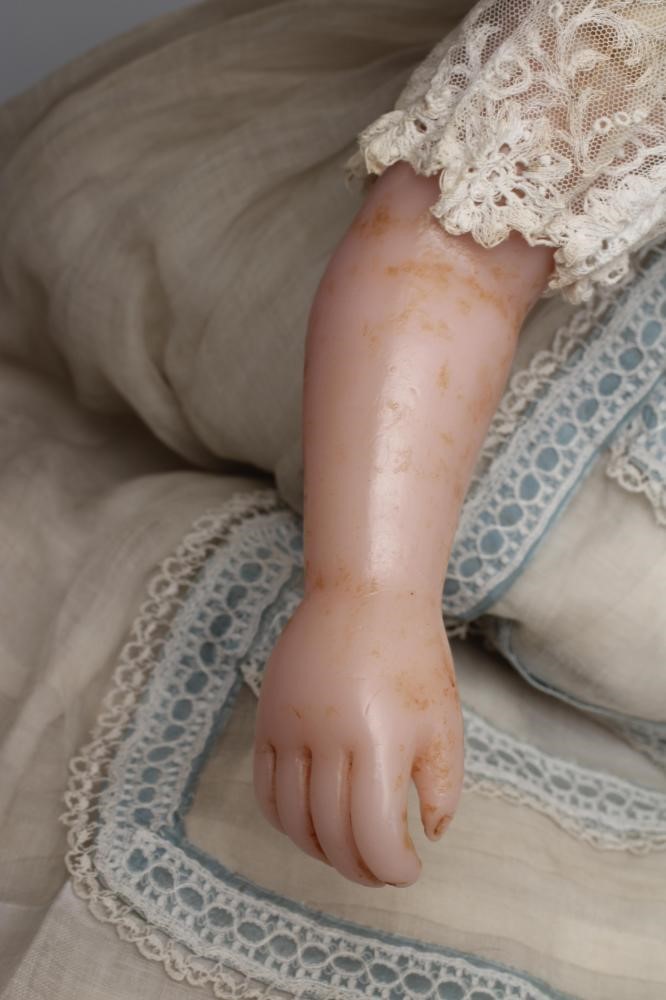 A large Victorian wax shoulder head doll Image