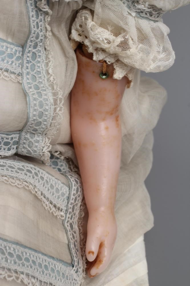 A large Victorian wax shoulder head doll Image