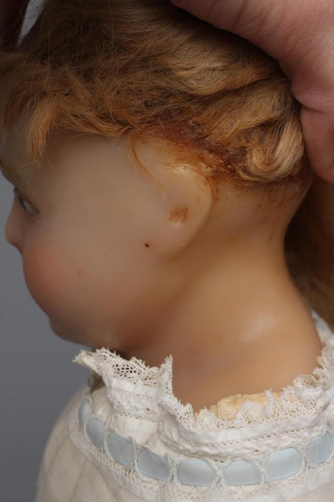 A large Victorian wax shoulder head doll Image