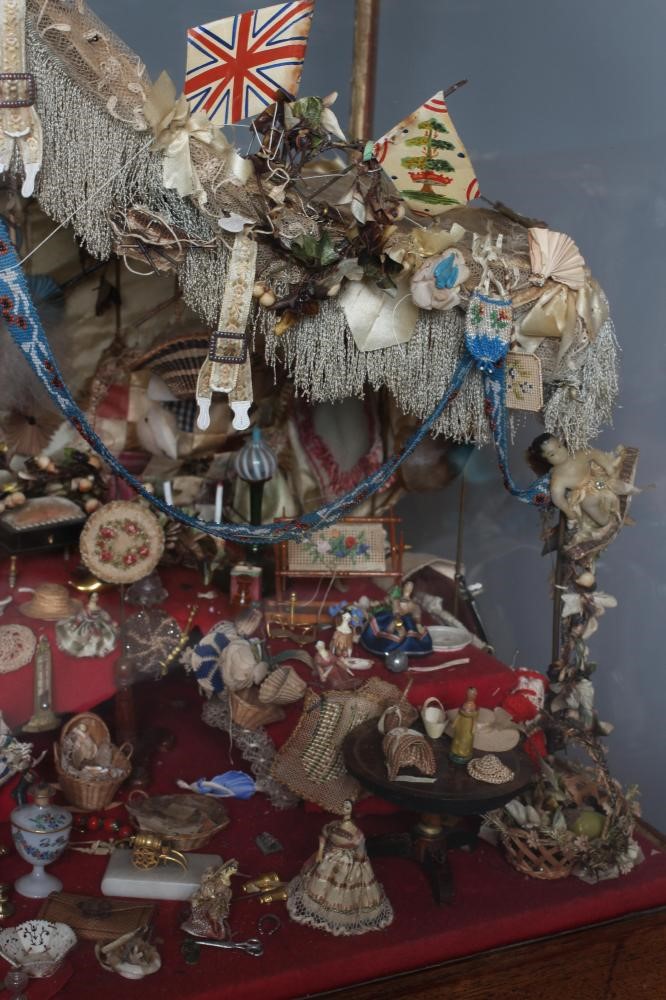 An antique glazed case sale stall diorama Image