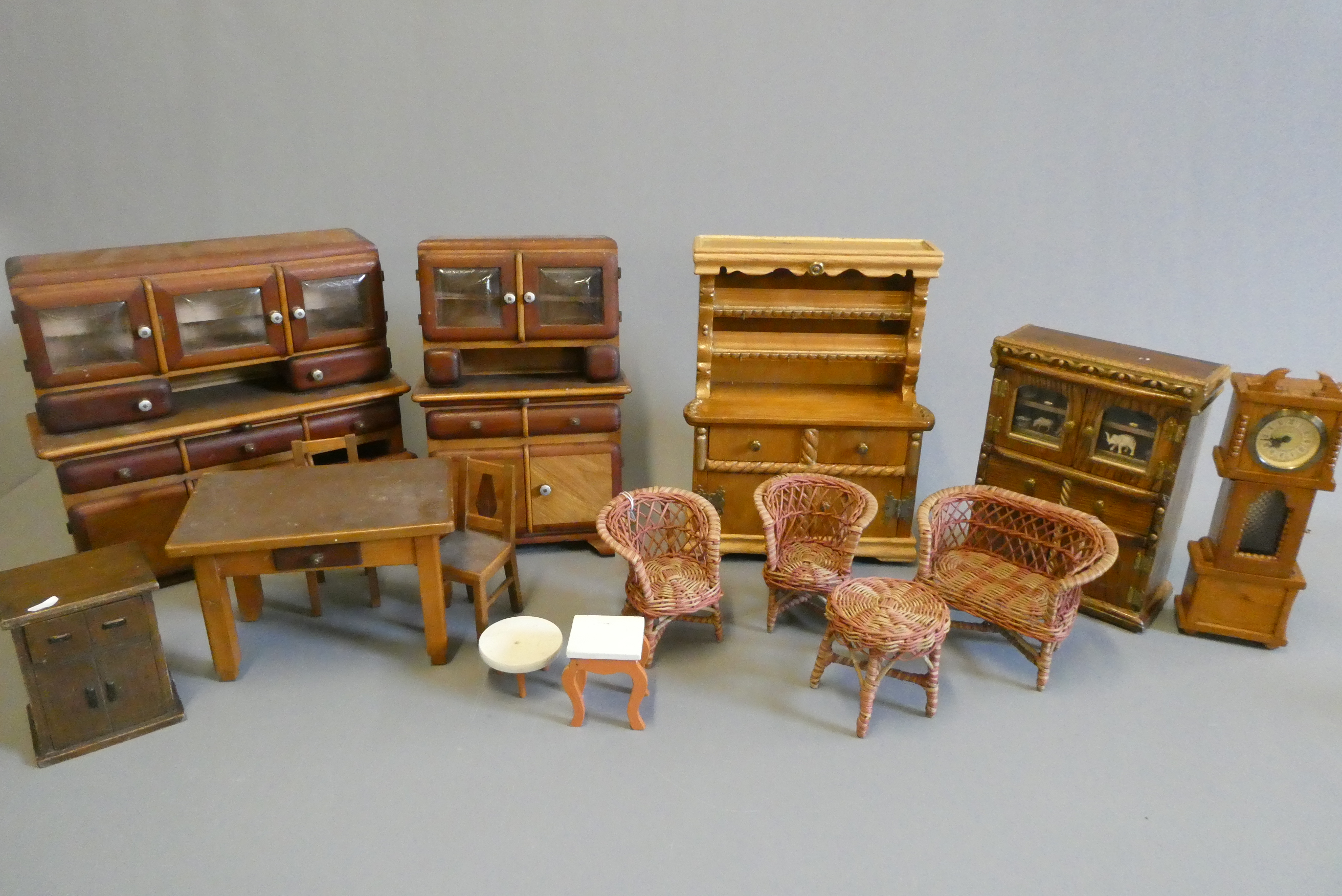 Three boxes of vintage doll's furniture Image