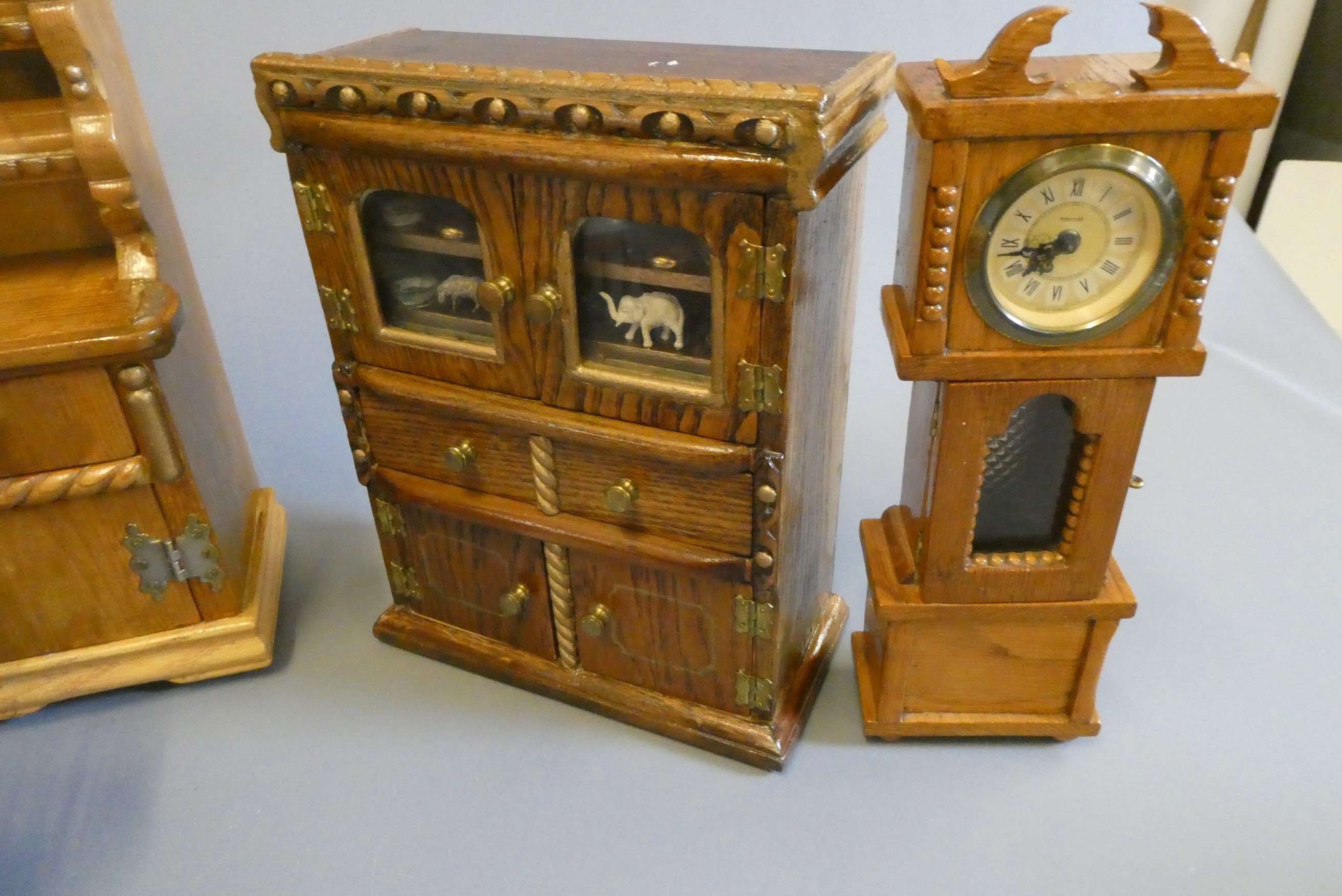 Three boxes of vintage doll's furniture Image