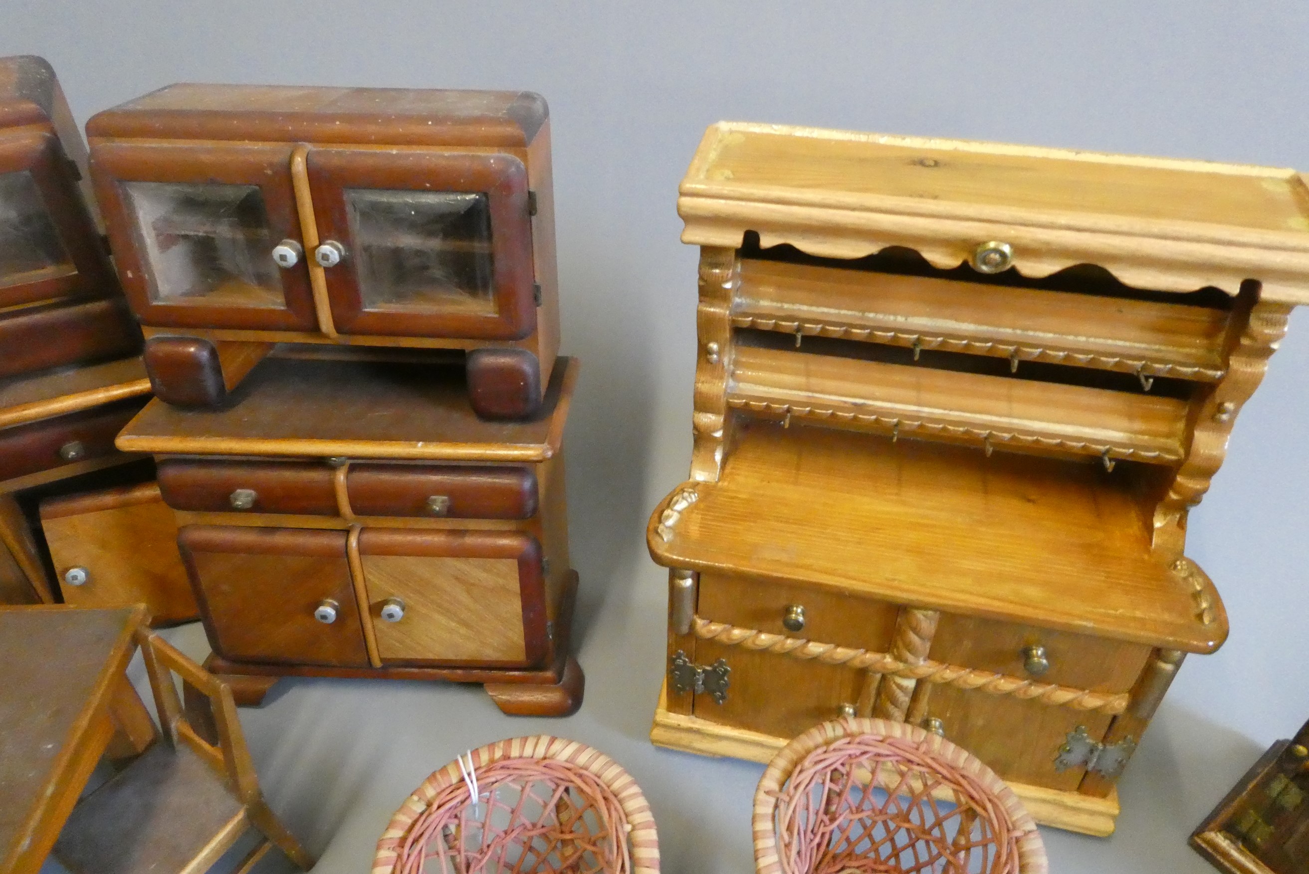 Three boxes of vintage doll's furniture Image