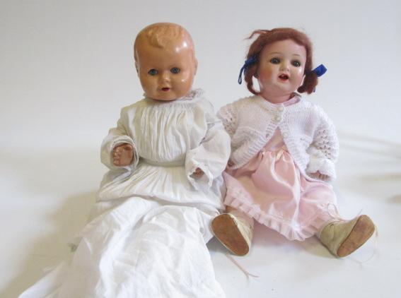 An Ernst Heubach all composition doll with blue glass sleeping eyes Image