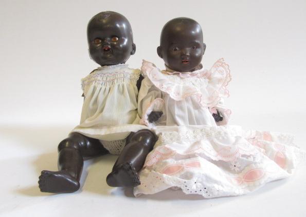 An August Steiner bisque head back doll with fixed brown glass eyes Image