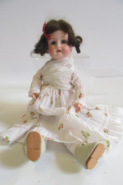 A J. Walther & Sohn bisque head doll with blue glass sleeping eyes Image