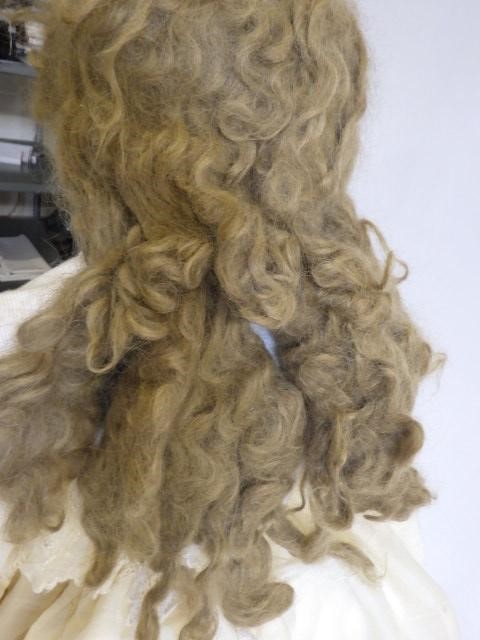 A large Simon & Halbig K & R bisque socket head doll with blue glass sleeping eyes Image