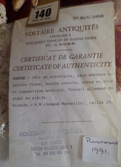 A large Armand Marseille bisque socket head doll with fixed brown glass eyes Image