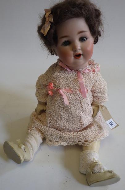 A German bisque socket head character crying doll with blue glass sleeping eyes Image