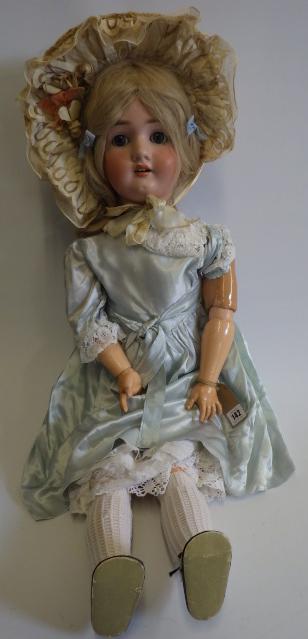 A large Simon & Halbig "P" bisque socket head doll with blue glass sleeping eyes Image