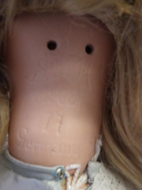 A large Simon & Halbig "P" bisque socket head doll with blue glass sleeping eyes Image