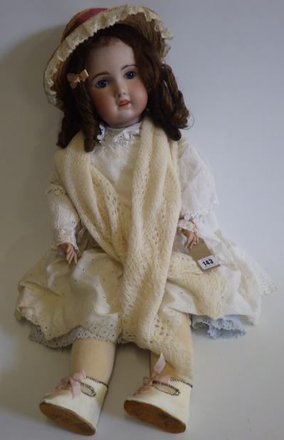 A large Jumeau bisque socket head doll with fixed blue glass eyes Image