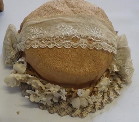 A large Armand Marseille bisque head and shoulders doll with fixed blue glass eyes Image