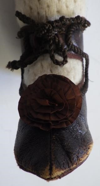 A large Armand Marseille bisque head and shoulders doll with fixed blue glass eyes Image