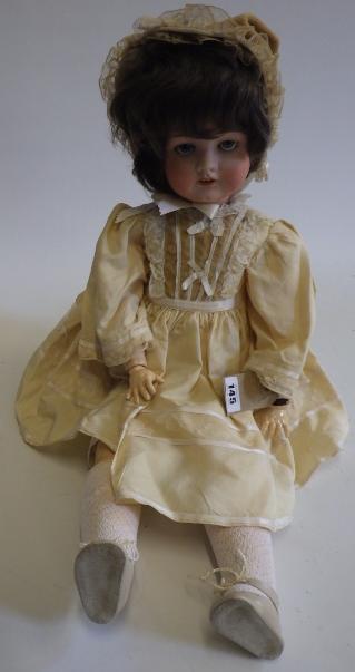 A German bisque socket head doll with sleeping blue glass eyes Image