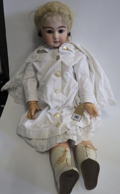 A large French bisque socket head doll Image