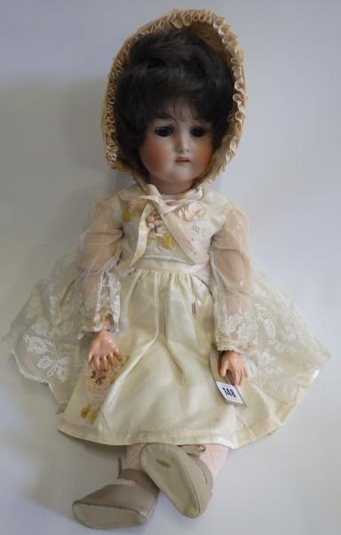 A German bisque socket head doll with sleeping brown glass eyes Image