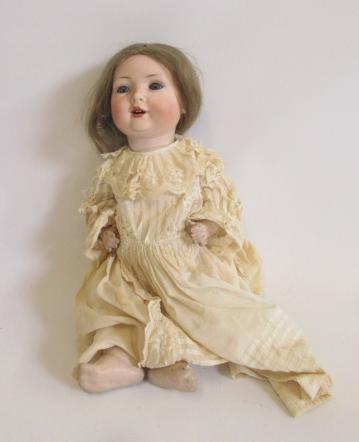 A Bahr & Proschild bisque head character doll with blue glass sleeping eyes Image