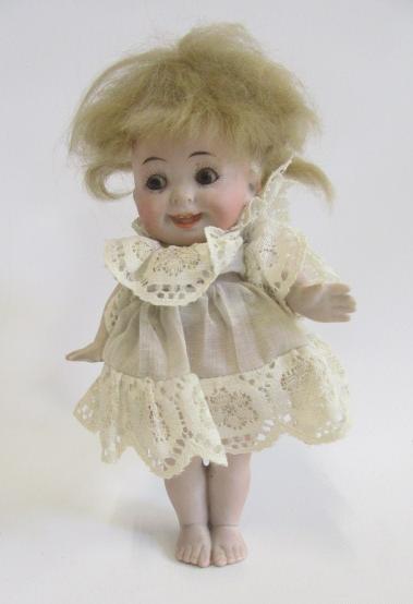 An all bisque googly eyed doll by Hertel Image